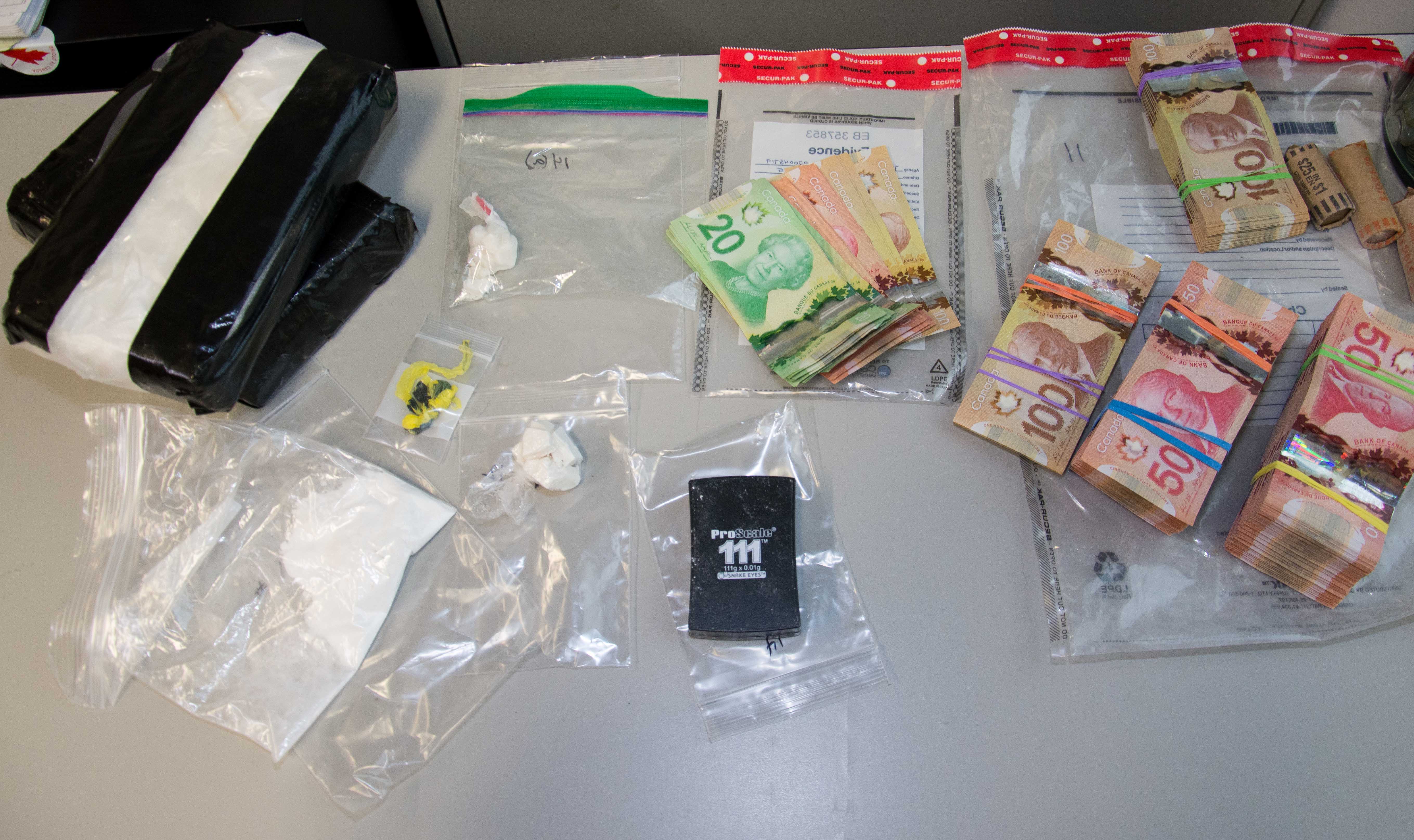 Police seize cocaine, cash amid drug investigation