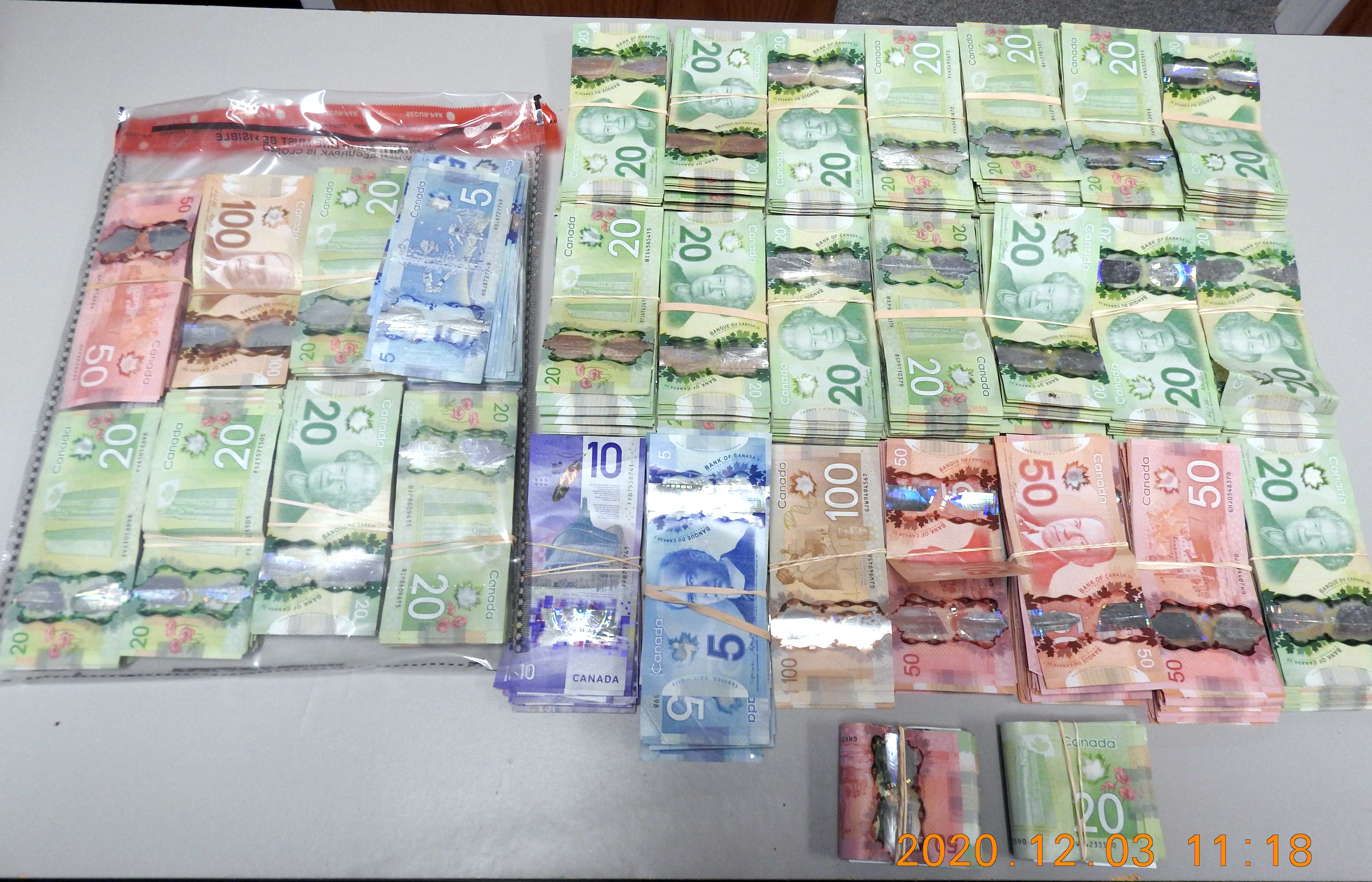 Three charged, $60K in cash seized amid home takeover investigation 