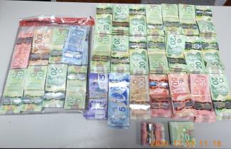 Three charged, $60K in cash seized amid home takeover investigation Three charged, $60K in cash seized amid home takeover investigation